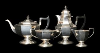 GEORGE VI SILVER TEA & COFFEE SERVICE, Birmingham 1938, octagonal panelled form with Bakelite