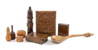 SMALL GROUP OF TREEN, including Indian carved sandalwood cardcase, Welsh burr wood 'love' spoon,