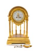 RARE FRENCH GILT BRONZE HALF HEMISPHERE MANTLE CLOCK, circular hand-painted porcelain dial with