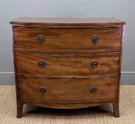 LATE REGENCY MAHOGANY BOW FRONT CHEST, reeded moulding, three graduated drawers with circular