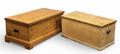 TWO 19TH CENTURY PINE TRUNKS with side handles, 48 (h) x 100 (w) x 52cms (d) and 50 (h) x 112 (w)