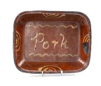 BUCKLEY WARE RECTANGULAR DISH, 19th century, slip glazed decoration 'Pork', 5.5 (h) x 30 (w) x 24cms