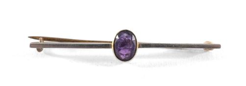 AMETHYST MOUNTED STOCK PIN, in unmarked yellow gold faced in white metal, 52mms (l), gross weight