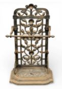 CAST IRON STICK STAND, floral design and pierced back, with drip tray, 83 (h) x 50 (w) x 26cms (d)