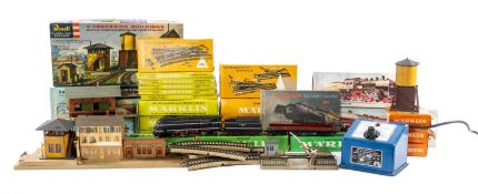 MARKLIN HO ELECTRIC TRAIN SET, including tank engine 3000, passenger engine with tender 3003,