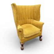 GEORGIAN STYLE PORTER'S CHAIR, with gold Draylon upholstery, carved cabriole frontal supports,