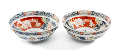 PAIR OF JAPANESE ARITA BOWLS, late 19th century, panels decorated with elephants and flowers, 9 (