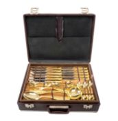 MODERN CANTEEN OF GOLD-PLATED STAINLESS-STEEL CUTLERY, presented within an attaché case