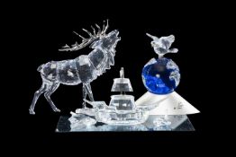 SWAROVSKI CRYSTAL SCULPTURES, including Crystal Planet 'Planet Vision' 2000, boxed and with