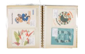 SHIPPING LINE INTEREST, an album of postcards, shipping line ephemera including Cunard luggage