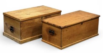 TWO 19TH CENTURY PINE TRUNKS with hinged lids, brass escutcheons, 43 (h) x 95 (w) x 56cms (d) and 39