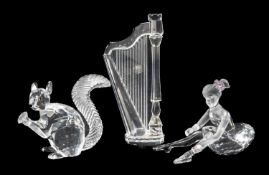 THREE SWAROVSKI 10TH ANNIVERSARY FIGURES, Squirrel, Seated Ballet Dancer, and Harp, all boxed