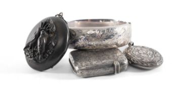 SILVER ENGRAVED HINGED BANGLE, silver vesta case, vine leaf engraved oval silver picture locket, and