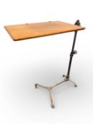 VICTORIAN CAST IRON & MAHOGANY ADJUSTABLE READING STAND, raised on cast claw and ball feet with