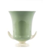 KEITH MURRAY FOR WEDGWOOD CELADON GREEN FOOTED URN, printed 'KM' mark, 25.5cms (h) Provenance: