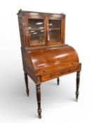REGENCY ROSEWOOD BONHEUR DE JOUR, c. 1810-30, with a glazed bookcase back opening to an adjustable