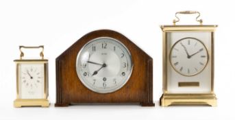 WOODFORD MODERN BRASS CARRIAGE STYLE MANTEL CLOCK, 14cms (h); Rapport brass mantel clock, 23.5cms (