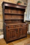 18TH CENTURY WELSH OAK DRESSER OF SMALL PROPORTIONS, Caernarfonshire, boarded half-canopy rack,