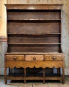 LATE 18TH CENTURY WELSH OAK DRESSER WITH RARE DESIGN BASE, Carmarthenshire, the rack with ogee