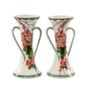 PAIR OF LLANELLY POTTERY VASES circa 1910, waisted form with three loop handles, painted by Samuel