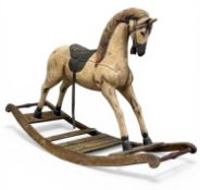VICTORIAN PAINTED & CARVED WOODEN ROCKING HORSE, on an eliptical base, 76 (h) x 123 (w) x 40cms (