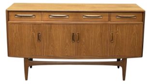 MID-CENTURY TEAK G PLAN SIDEBOARD, with three drawers and four cupboard doors, 84 (h) x 152 (w) x