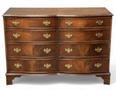 REPRODUCTION MAHOGANY SERPENTINE-FRONTED SIDE-BY-SIDE CHEST of eight drawers, with brass drop