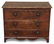 PRIMITIVE 19TH CENTURY VERNACULAR STAINED-PINE CHEST probably Welsh, of small proportions, three
