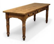 PINE RECTANGULAR KITCHEN TABLE, three frieze drawers with turn knob handles, turned supports, 76 (h)