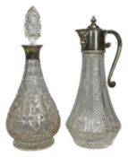 CUT GLASS DECANTER, with geometric decoration, silver collar, and with pointed stopper, 31cms (h);