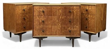 HEALS FIGURED TEAK THREE-DRAWER CHESTS, 68 (h) x 76 (w) x 47.5cms (d) (3) Provenance: private