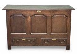 THREE-PANEL OAK MULE CHEST, circa 1900, with two base drawers, 87 (h) x 142 (w) x 51cms (d)