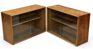 TWO HEALS MODULAR FIGURED TEAK WALL CABINETS (no label), with sliding glass doors and adjustable