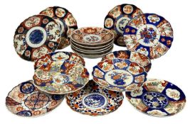 COLLECTION OF SEVENTEEN VARIOUS IMARI CIRCULAR SHALLOW DISHES, traditional decoration, 22cms (diam.)