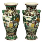 CHINESE FAMILLE VERTE PAIR OF VASES, decorated with figures in a garden and with relief mask head