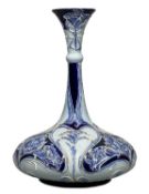 JAMES MACINTYRE FLORIAN VASE, c. 1915, blue cornflower pattern, circular squat body with long