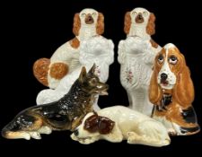 20TH CENTURY CERAMIC DOG FIGURES, including Goebel recumbent Alsatian, 44cms (l); Goebel recumbent