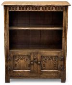 20TH CENTURY OAK PRIORY STYLE BOOKCASE CUPBOARD, two shelves over two carved cupboard doors, 92 (