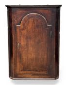 ANTIQUE OAK CORNER CABINET, with shaped interior shelves, 111 (h) x 81 (w) x 45cms (d) Provenance: