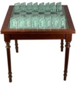 HERITAGE ETCHED GLASS CHESS SET & BOARD, on handmade mahogany table stand Provenance: private
