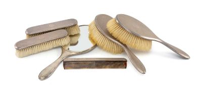 GEORGE V SILVER ARMORIAL DRESSING TABLE SET, Charles Henry Dumenil, London 1913/14, machine tooled