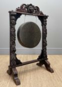 RENAISSANCE STYLE CARVED OAK DINNER GONG, decorated with lion mask, acanthus and fruiting vine