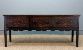 18TH CENTURY OAK DRESSER BASE, moulded top above three deep short frieze drawers, cut shaped
