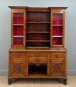 VICTORIAN STYLE OAK GLAZED DRESSER, upper section with cabinets flanking recessed open shelves, base