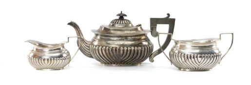 GEORGE V THREE-PIECE SILVER TEA SERVICE, William Devenport, Birmingham 1922, of half-gadrooned