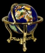 LARGE GEMSTONE WORLD GLOBE on gilt metal stand, with central compass, 50cms (h) Provenance: