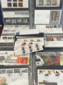 THREE ALBUMS OF ROYAL MAIL FIRST DAY COVERS and full sets of Royal Mail stamps, 2012 Olympics Team