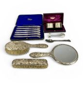 ASSORTED SILVERWARE, including embossed silver-backed hand mirror and hairbrush, cased set of six