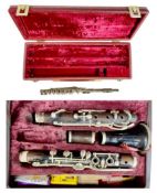 JEROME, LONDON CLARINET, in case with reed cutter and sundry reeds; with a silver-plated piccolo and