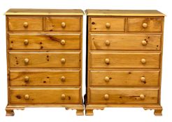 MODERN PINE PAIR OF CHESTS of two over four drawers, 108 (h) x 81 (w) x 45cms (d) Provenance: